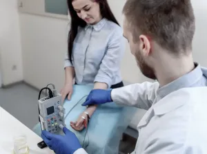A woman receiving an electro diagnostic study